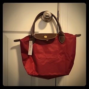 BRAND NEW! Wine color bag